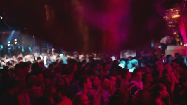 crowd on the dancefloor at a nightclub