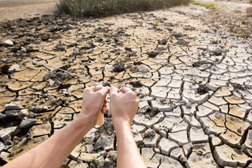 People search for water, metal frame to find water