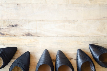 woman shoe on wooden background