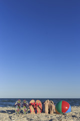 Obraz premium Happy children on the beach during the summer.