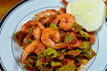 spicy stir fried wing bean with shrimp in curry on dish