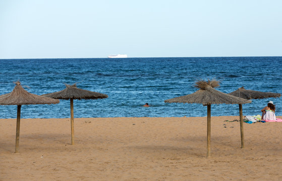Straw umbrella on the beach