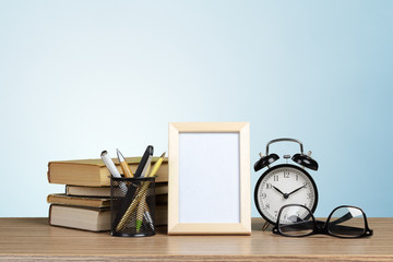 Alarm clock and book.