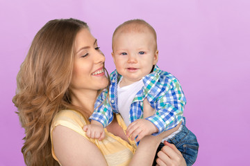Happy young mother and her son