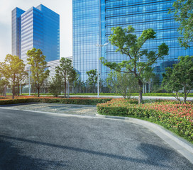 city empty traffic road with cityscape in background