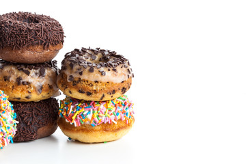 various donuts on white background