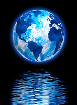 image of the planet earth in the reflection of water close-up