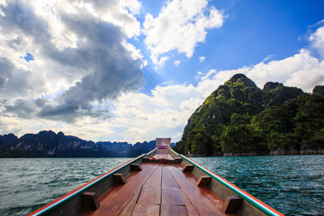 Prow of boat while sailing through Ratchaprapa (Cheow Lan) dam., Surat Thani, Thailand