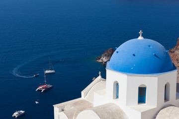 Fototapeta na wymiar Blue dome of Oia, Santorini.