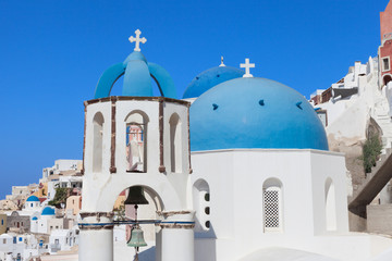 White houses and blue domes of Oia, Santorini.