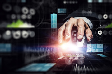 Businessman using wireless mouse . Mixed media