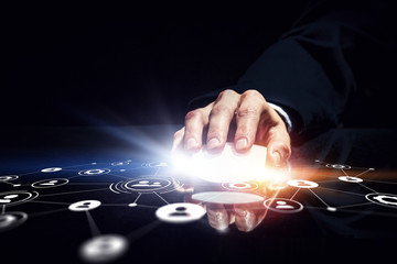 Businessman using wireless mouse . Mixed media