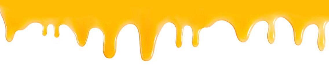 Isolated image of flowing honey closeup