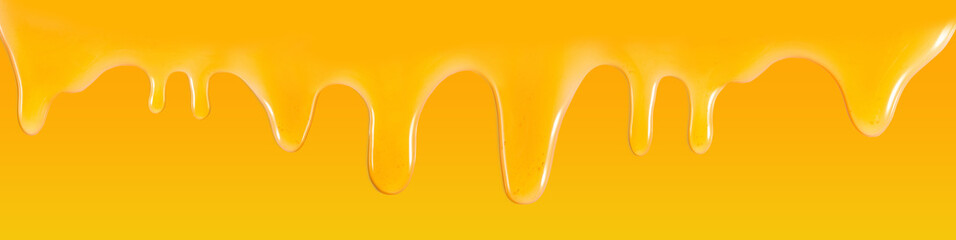 Isolated image of flowing honey closeup