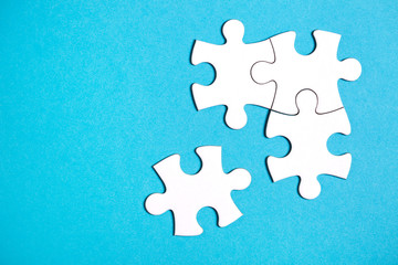 Four disconnected jigsaw puzzle pieces