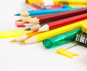 Pens, pencils, erasers with emoticons, a set of notebooks. Schoolchild and student studies accessories. Back to school concept.
