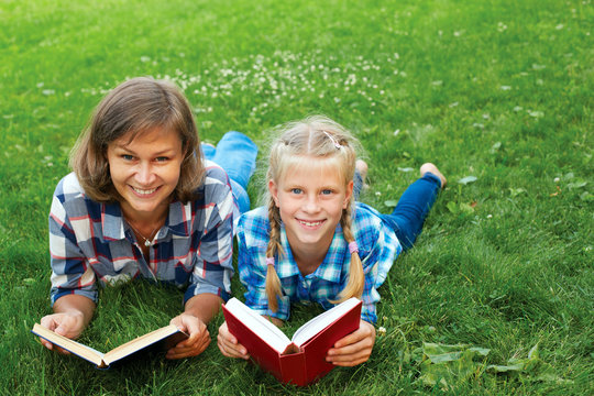 Parent And Child Reading Books Together