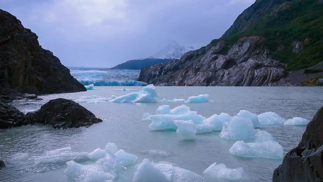 ice floating in grey glacier patagonia, chile