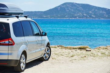 travelling. Automobile minivan view near sea beach - obrazy, fototapety, plakaty