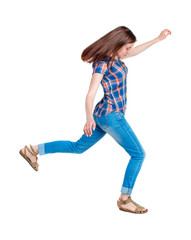 Balancing young woman.  or dodge falling woman. Rear view people collection.  backside view of person.  Isolated over white background. Girl in plaid shirt jumping.