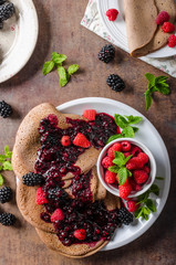 Cocoa pancakes with forest fruit