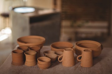 Various pottery on table