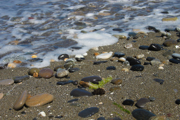 Obraz premium Fondo de playa con arena y rocas