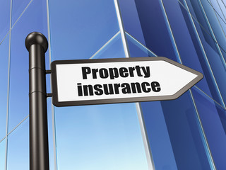 Fototapeta premium Insurance concept: sign Property Insurance on Building background