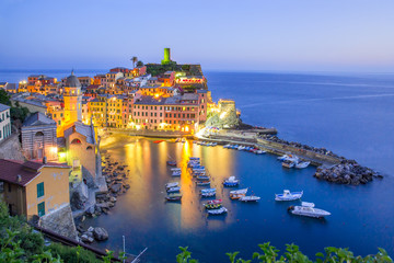 Aerial night view of Vernazza fishing village, seascape in Five lands, Cinque Terre National Park, Liguria, Italy.