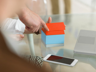 Teamwork and cooperation concept, hands building a structure of