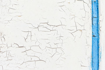 The blue-white old painted wooden surface