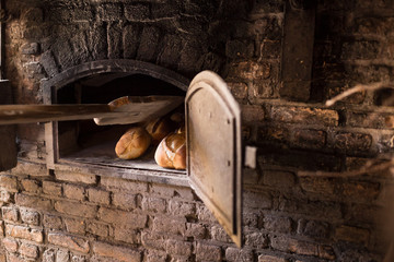 Old brick kiln, with bread, in a bakery
