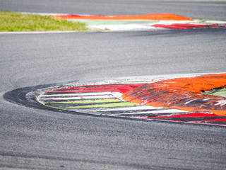 Circuit curb detail, colorful, motorsport concept. Intentionally blurred.