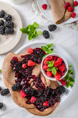 Cocoa pancakes with forest fruit
