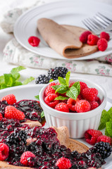 Cocoa pancakes with forest fruit