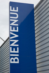 The French Word Bienvenue, which means Welcome, written on billboard