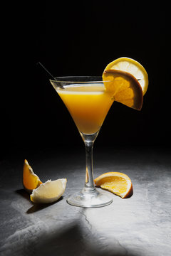 drink with orange on a dark background
