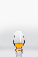 tasting a glass of whisky 