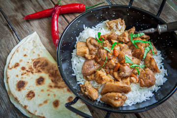 Indian tikka masala chicken and naan flat bread