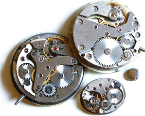  mechanisms for hours on a wooden or white