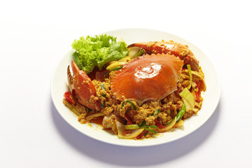 Stir fried crab with curry powder on white background © bennnn