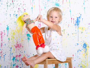 Child hugs her doll