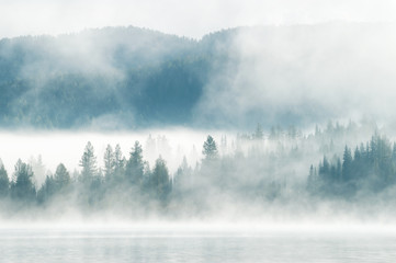 Heavy fog in the early morning on a mountain lake
Early morning on Yazevoe lake in Altai mountains, Kazakhstan  - 117923700