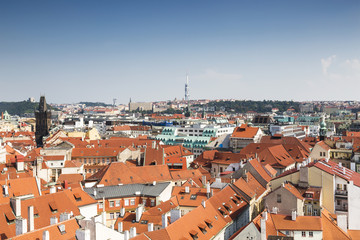 Fototapeta na wymiar Panorama of Prague downtown with red roofs and Charles bridge tower