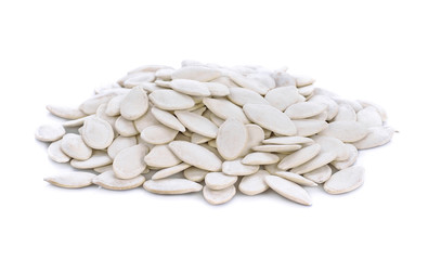 Pumpkin seeds on the white background