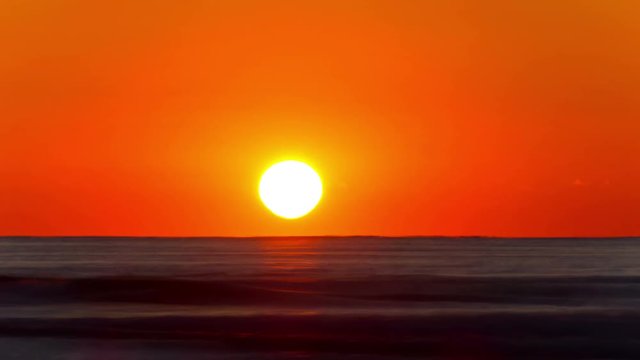 
4k. Sea  morning sunrise  in red tones . Time lapse without birds.
