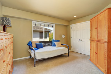 Naklejka na ściany i meble Comfortable sitting room with storage combination