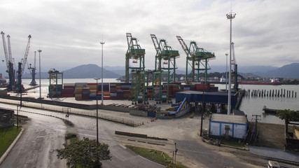 Aerial view Port of Santos - Container ship being loaded at the