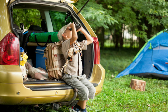 Boy With Car In Nature Camping