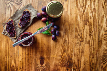 Sandwich with fresh plum jam with text space